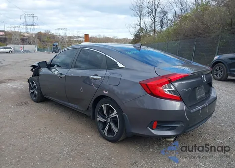 2017 Honda Civic Touring z USA, uszkodzony, nr VIN 2HGFC1F97HH654564